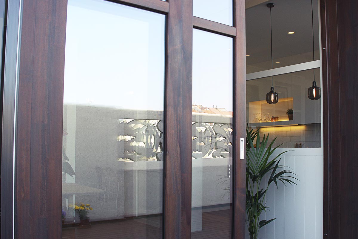 ventana de madera corredera con control térmico en Barcelona - Carreté Finestres